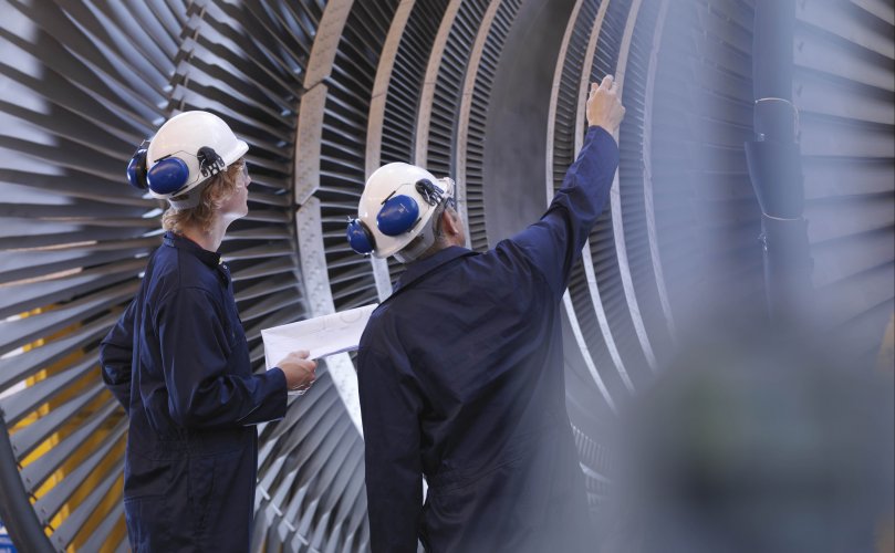 Intersafe two men looking at turbine