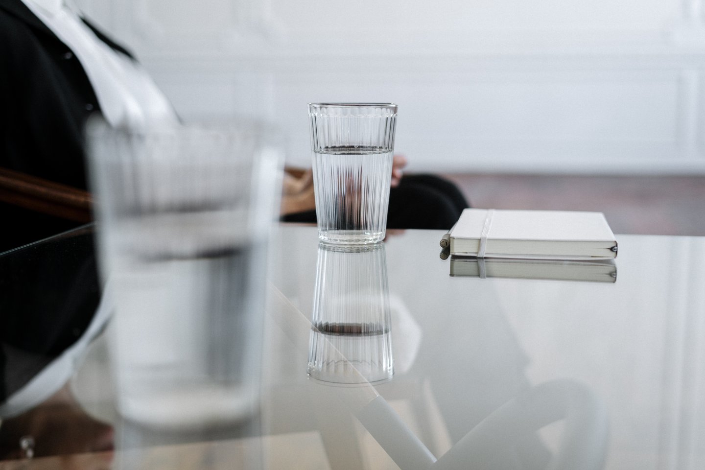 water in cup on office desk