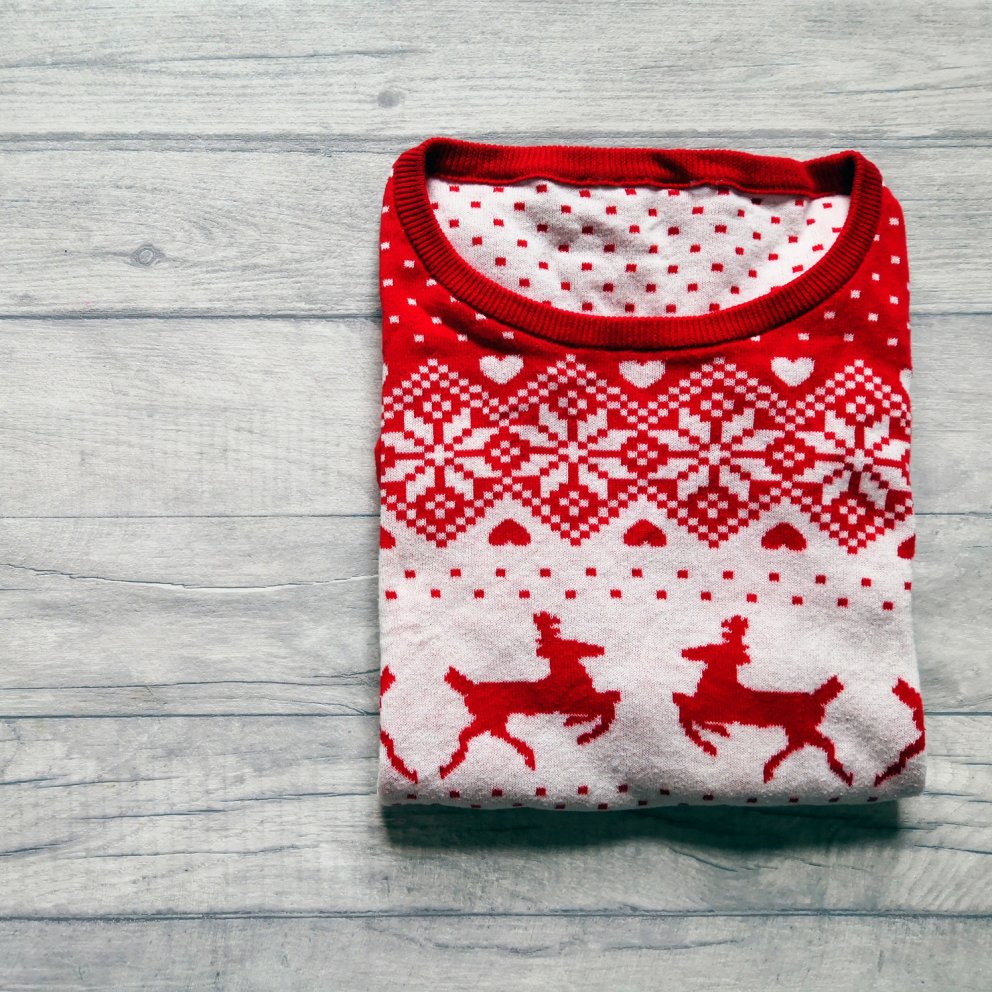 red christmas jumper with rendeers