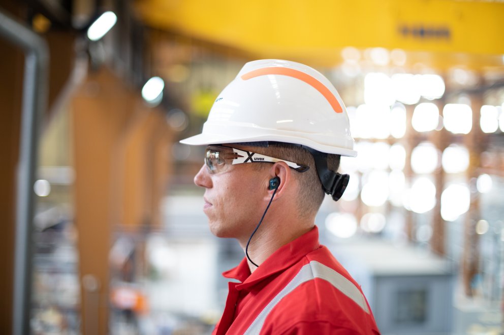 side profile of a man wearing safety equipment